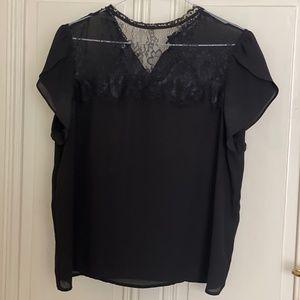Black Zara top with lace collar and button closure - size M